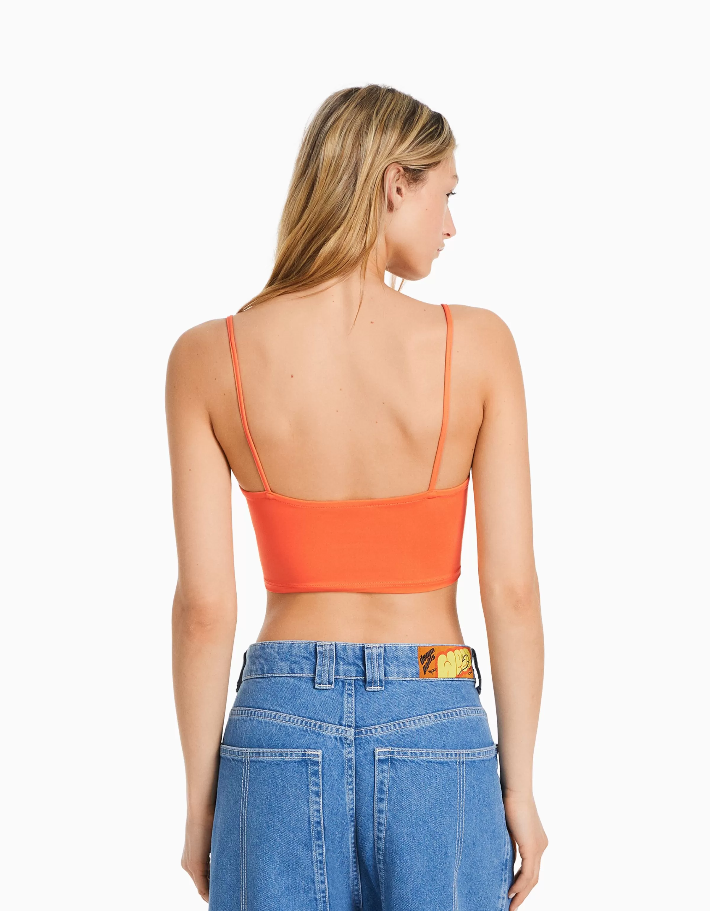 Top Corto con Spalline Sottili - Bianco Puro BERSHKA  
Bustier e Reggiseni Stile Minimal Da Donna  
Essential Linee Sottili Estate 2024