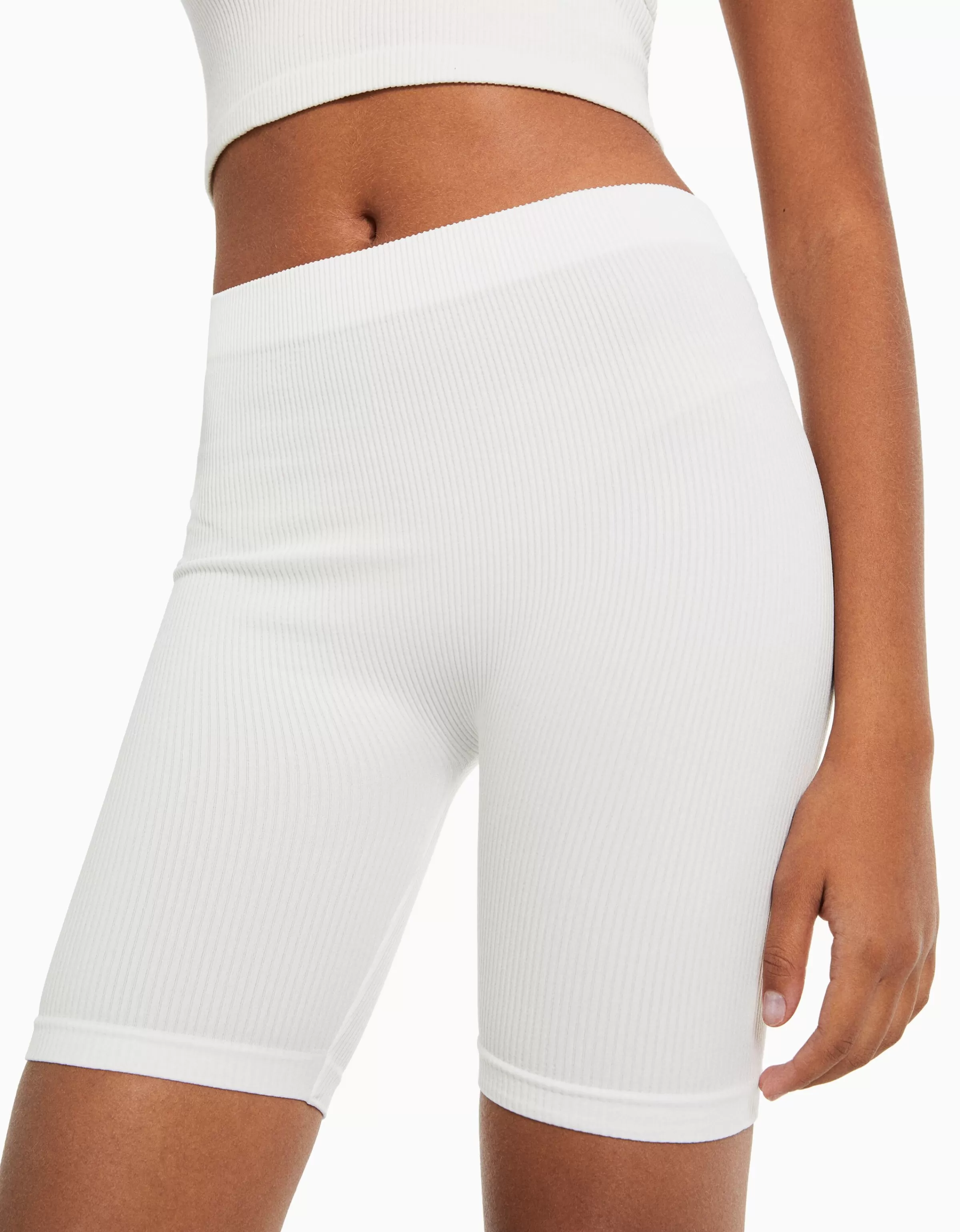 BERSHKA - Tuta da Ciclismo Confortevole con Tecnologia Seamless e Dettaglio Bordi a Coste, Nero Perfetto per Allenamento Dinamico