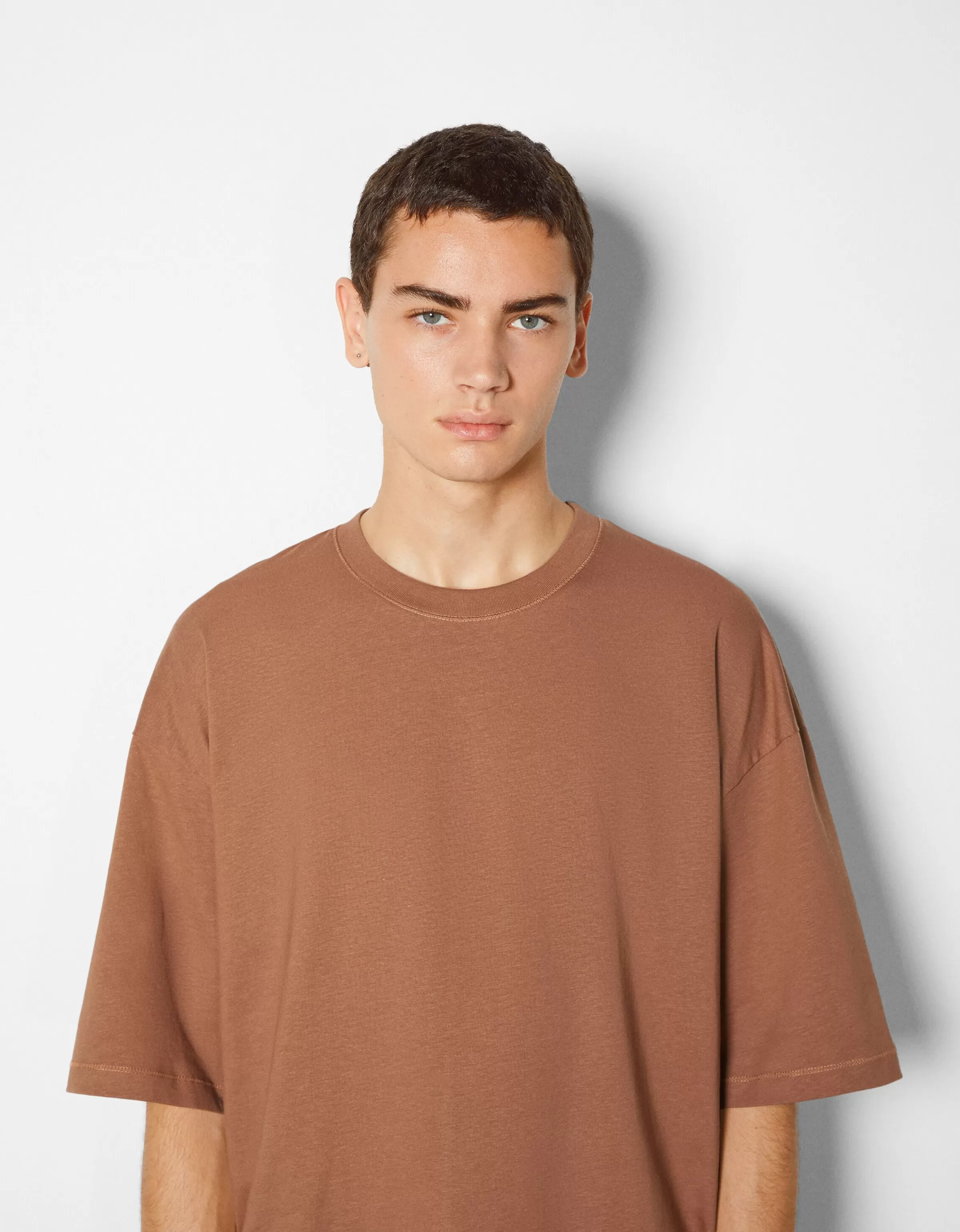 Maglietta oversize con maniche corte Bershka - Comoda e ampia in tonalità arancione intenso per uno stile urban chic